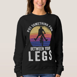 Put something fun between your legs for a cycling sweatshirt