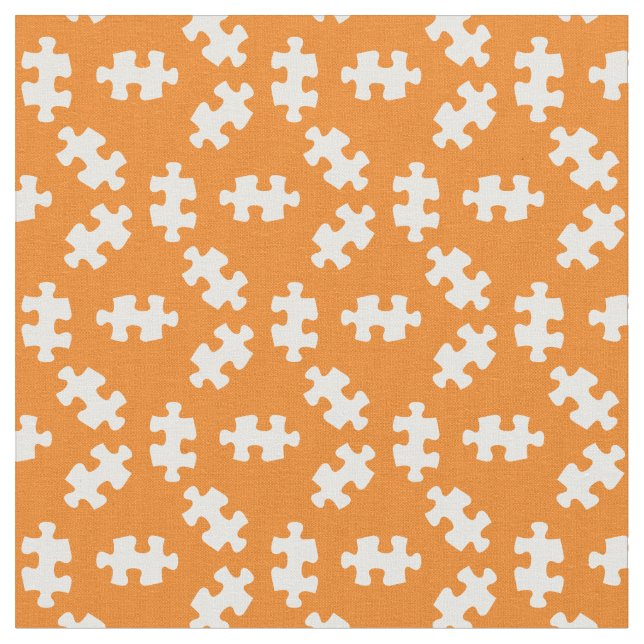 Puzzle Pieces Orange and White Fabric (Close Up)