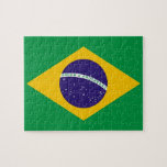 Puzzle with Flag of Brazil<br><div class="desc">Challenge yourself with this captivating puzzle featuring the flag of Brazil! Crafted with meticulous attention to detail, this puzzle is more than just a recreational activity; it's a celebration of Brazilian heritage and national pride. The design proudly showcases the iconic green field with a yellow diamond shape containing a blue...</div>