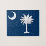 Puzzle with Flag of South Carolina State<br><div class="desc">Embark on a delightful puzzling journey while celebrating your South Carolinian pride with this captivating puzzle featuring the flag of South Carolina! Crafted with precision and high-quality materials, this puzzle showcases the iconic design of the South Carolina flag – featuring a blue field with a white palmetto tree and crescent....</div>