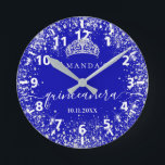 Quinceanera royal blue silver glitter tiara name round clock<br><div class="desc">For an elegant Quinceañera,  15th birthday.  A trendy royal blue background colour. Decorated with faux silver glitter dust, a tiara crown. Personalise and add a name,  age and a date. Quinceañera is written with a modern hand lettered style script with swashes.</div>