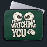 Quirky "I'M WATCHING YOU" Retro Eyes Laptop Sleeve<br><div class="desc">Protect your laptop with a touch of wit! This "I'm Watching You" laptop sleeve features a bold, suspicious eye illustration that’s sure to get a laugh at the office or coffee shop. The deep forest green background gives it a sophisticated yet fun vintage look. High-quality protection for your tech with...</div>