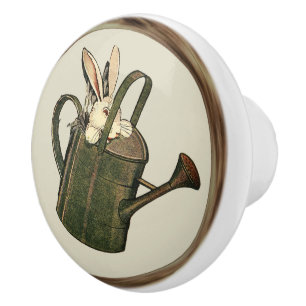 RABBIT IN WATERING CAN TAN RING BORDER CERAMIC KNOB
