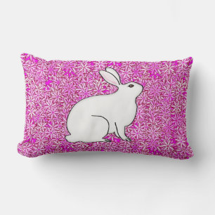 Rabbit on a bed of spring flowers lumbar cushion