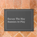Rabbit Owners Funny Excuse The Hay Quote Grey Door Doormat<br><div class="desc">Bunny owners can now warn potential visitors to expect hay and straw on the floor with this dark grey doormat. When house rabbits are free to roam and play, stray hay will follow them around no matter how quickly you tidy up. Make a light-hearted joke out of it to unexpected...</div>