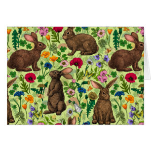 Rabbits and wildflowers on honeydew green