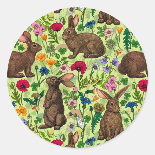 Rabbits and wildflowers on honeydew green classic round sticker (Front)