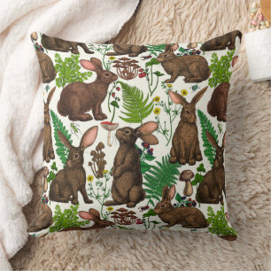 Rabbits and woodland flora 4 cushion