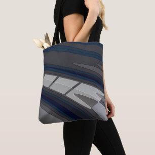 Race on blue grey track tote bag