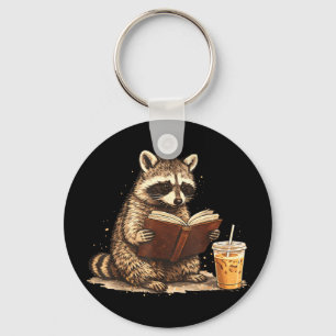 Racoon drinking iced coffee & reading book key ring