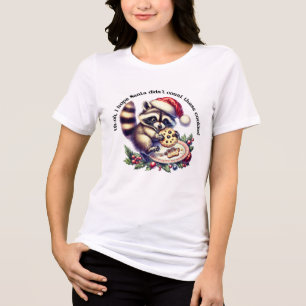 Racoon in a Santa hat enjoys cookies at Christmas Tri-Blend Shirt