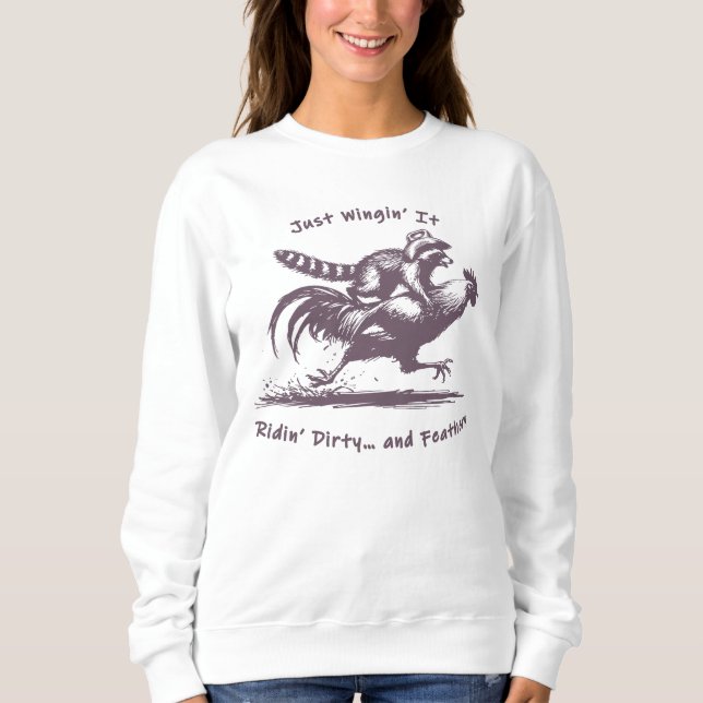 Racoon Riding Rooster – Barnyard Rodeo Cowboy Sweatshirt (Front)
