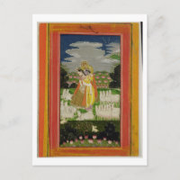 Radha and Krishna embrace in an idealised landscap
