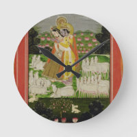 Radha and Krishna embrace in an idealised landscap