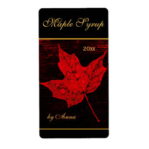 Rain drops on red maple leaf