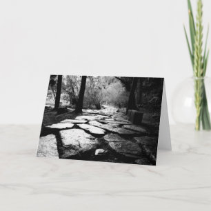 Rain-soaked paving stones card