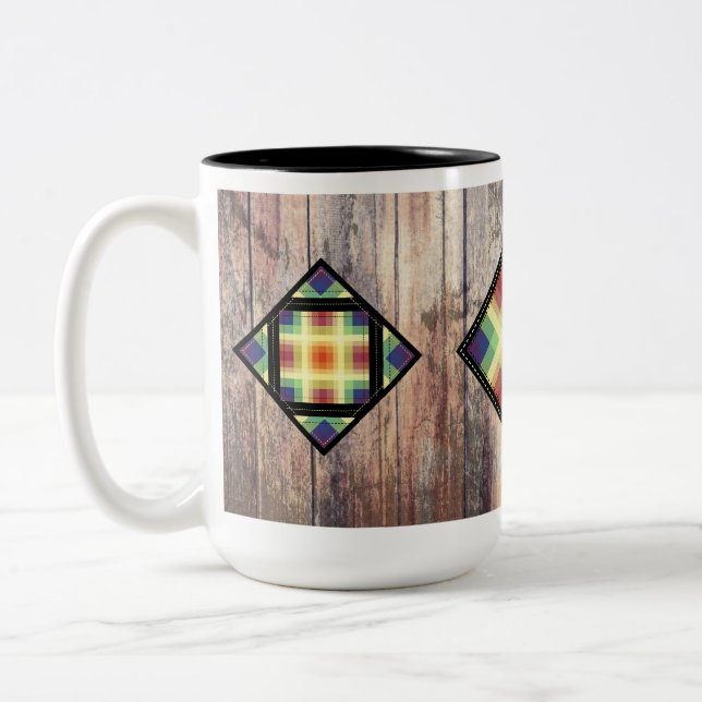 Rainbow barn quilts against barn wood Two-Tone coffee mug (Left)