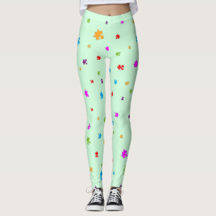 Rainbow Coloured Autism Puzzle Pieces on GREEN Leggings