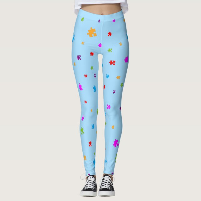 Rainbow Coloured Autism Puzzle Pieces on LIGHT BLU Leggings (Front)