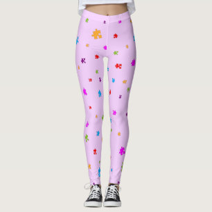 Rainbow Coloured Autism Puzzle Pieces on PINK Leggings