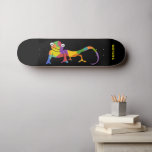 Rainbow Coloured Cartoon Chameleon Personalised Skateboard<br><div class="desc">This skateboard is ready to be personalised with a name or other custom text. It features a brightly coloured cartoon illustration of a chameleon set against a black background with your text in bold lime green lettering.</div>