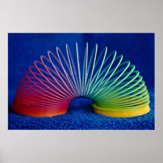 Rainbow-coloured slinky toy poster