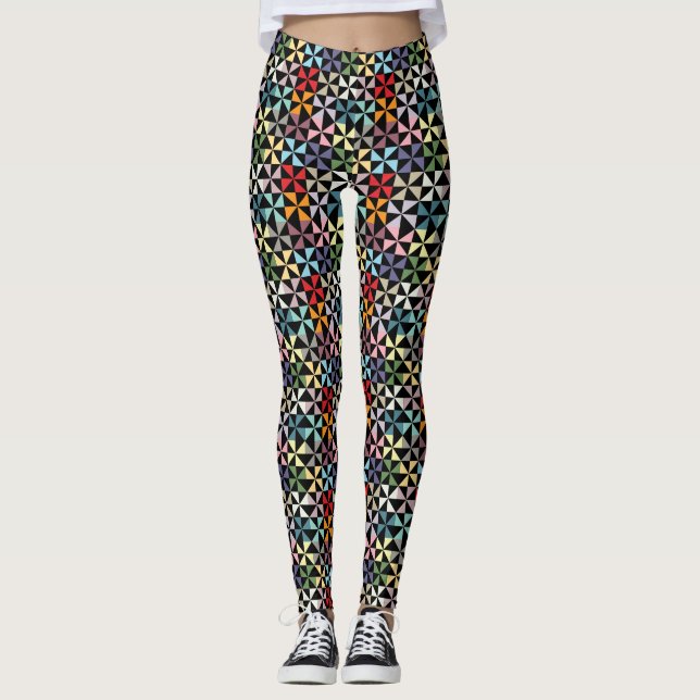 Rainbow Geometric Pinwheel Pattern on Black Leggings (Front)