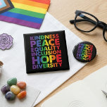 Rainbow Kindness Peace Equality Inclusion Hope  15 Cm Square Badge<br><div class="desc">This bold rainbow word art design features the words kindness, peace, equality, inclusion, hope, and diversity on a black background. The bright multicolor lettering creates a strong message of support, acceptance, and positivity with a clean high-contrast look. The stacked typography makes the design easy to read while giving it a...</div>