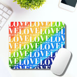 Rainbow LGBT Pride Love Is Love Mouse Pad<br><div class="desc">This colourful desk mat is decorated with a watercolor rainbow background and a Love is Love pattern in stylish white typography.</div>