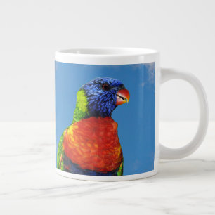 Rainbow lorikeets two perched on a branch large coffee mug