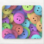 Rainbow of Colourful Happy Faces Mouse Pad<br><div class="desc">A background filled with smiling happy face buttons. Nice selection of bright and happy colours including pink,  purple,  green and yellow. Cute child-like design for those who love cute cheerful things.</div>