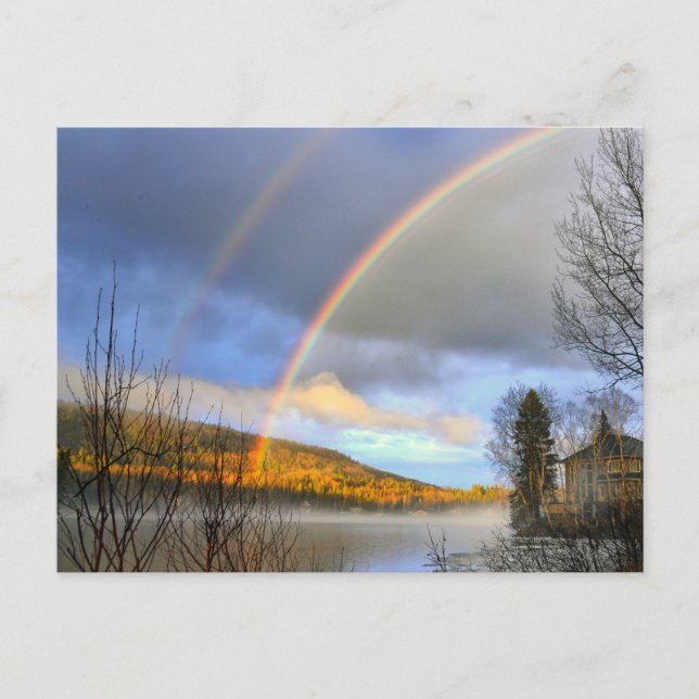 Rainbow over lake and house after storm postcard (Front)