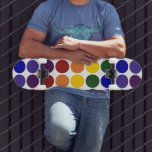 Rainbow Polka Dots on White Skateboard<br><div class="desc">Rainbow coloured polka dots are arranged in rows on a white background. The offset rows form diagonals of each colour: violet, indigo, blue, green, yellow, orange, and red. The white background is actually transparent, so you can change it if you like. Just click the "Customise it!" button, then select a...</div>