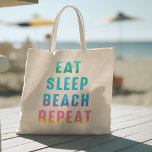 Rainbow Pride Eat Sleep Beach Repeat Tote Bag<br><div class="desc">Bright funny summer tote bag with the words "EAT SLEEP BEACH REPEAT" in rainbow ombre colours.</div>