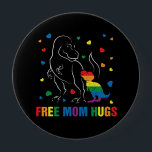 Rainbow Pride Free Mum Hugs Dinosaur Cute 10 Cm Round Badge<br><div class="desc">This design was created though digital art. It may be personalised in the area provided or customising by choosing the click to customise further option and changing the name, initials or words. You may also change the text colour and style or delete the text for an image only design. Contact...</div>