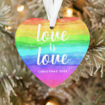 Rainbow Pride Love is Love Christmas Heart Shaped Ornament<br><div class="desc">A special ornament to show and share your PRIDE. The double sided heart shaped ornament features a watercolor rainbow background with the quote love is love in a modern white typography. Personalise with Christmas and the current year.</div>