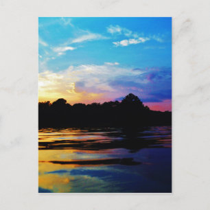 Rainbow sunset on mountain Lake Postcard