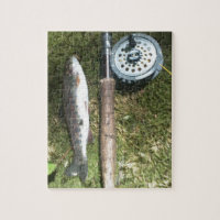 rainbow trout and fly fishing reel