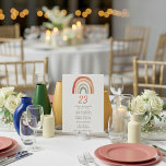 Rainbow wedding table number card guest name list<br><div class="desc">This wedding table card features a cheerful rainbow design in soft tones, with space to display the table number and a neatly arranged list of guest names. It pairs perfectly with the full wedding suite for a colourful, rustic celebration. Ideal for summer weddings or garden receptions with a relaxed, joyful...</div>