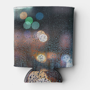 Raindrops, night city: window view. can cooler