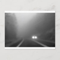 Rainy night - approaching headlights