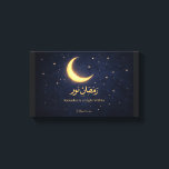 Ramadan Moon Islamic Art – Ramadan Is a Light With Canvas Print<br><div class="desc">Celebrate the beauty and spiritual glow of Ramadan with this elegant crescent moon artwork. Featuring a luminous golden crescent surrounded by stars on a deep midnight-blue background, this design symbolizes the light, reflection, and serenity of the holy month. The Arabic calligraphy “Ramadan Nur” is paired with the inspiring message “Ramadan...</div>