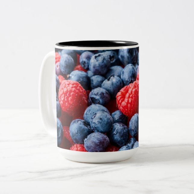 Raspberries and Blueberries Two-Tone Coffee Mug (Front Left)