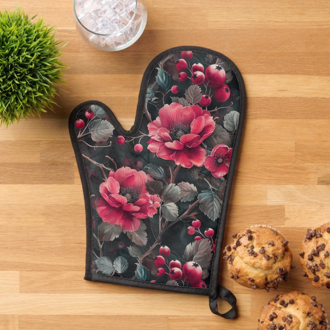 Raspberry, burgundy flowers on dark gray oven mitt (Top down)