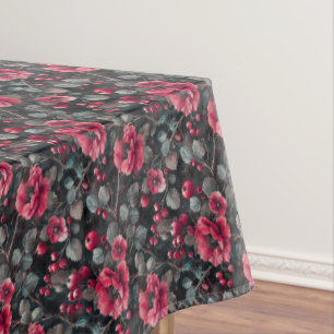 Raspberry, burgundy flowers on dark gray tablecloth