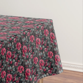 Raspberry, burgundy flowers on dark gray tablecloth