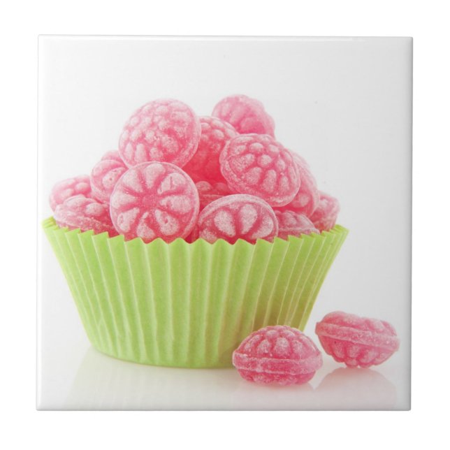 Raspberry tasty candy sweets in green cup cake tile (Front)