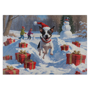 Rat Terrier Running in Snow with Christmas Hat Cutting Board