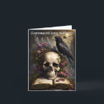 Raven Skull Book and Flowers Gothic Birthday Card<br><div class="desc">A raven perches on a skull placed on an open book and surrounded by flowers,  urging the viewer to "contemplate your mortality" on this Gothic-themed birthday card.  Beautiful,  with a touch of dark humour.</div>