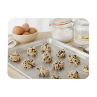 Raw cookies on baking tray magnet